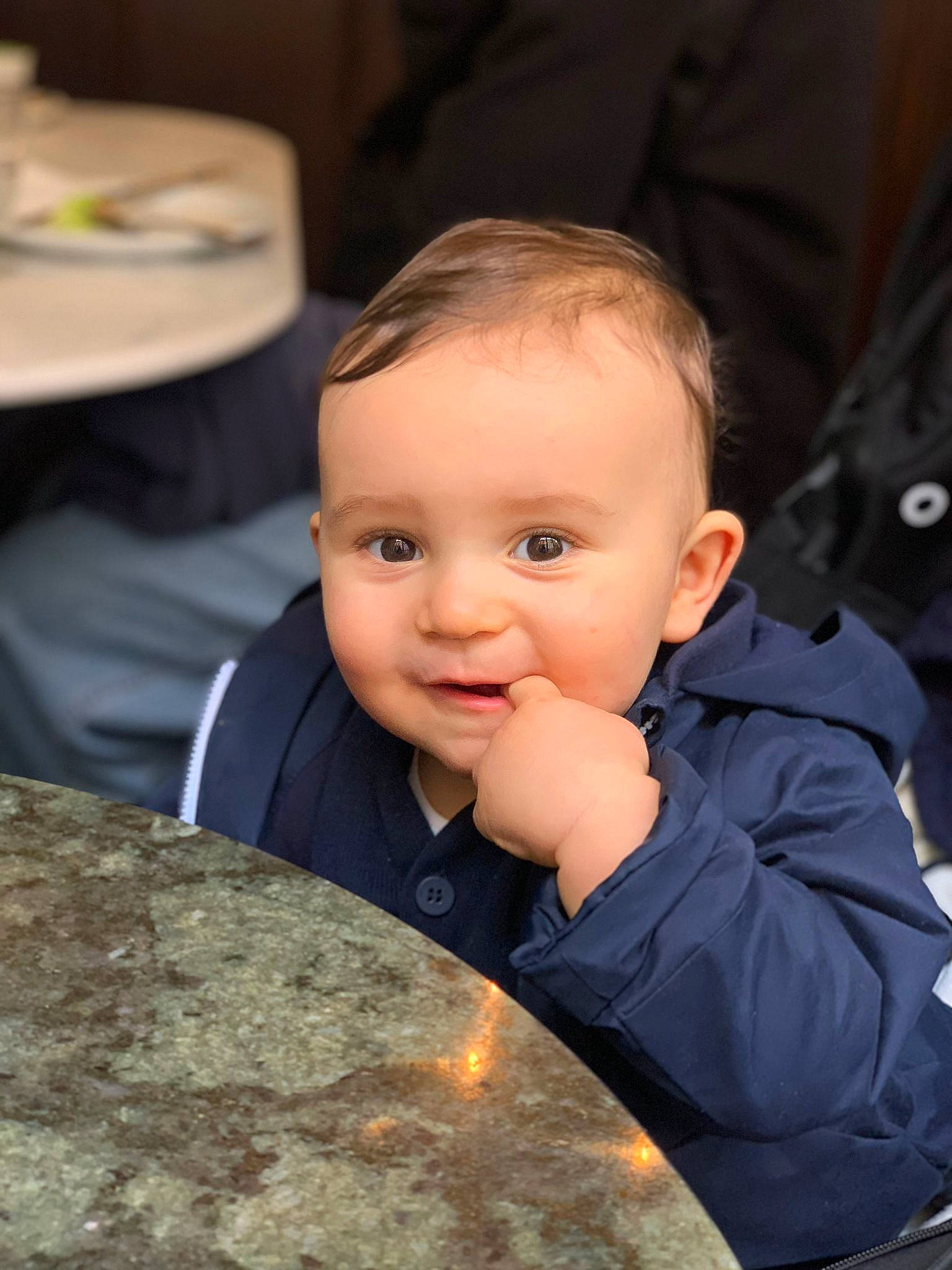 Louis participe au concours pour gagner de l'argent avec cette photo : baby, cheek, child, event, flash_photography, flooring, formal_wear, fun, happy, iris, nose, person, rock, sitting, skin, sleeve, smile, tableware, toddler, vacation