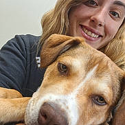 Ace joined the competition — help win amazing prizes! animal, blonde_hair, blue_collar, brown_dog, casual_clothing, close_up, companion, cuddling, dog, face, friendship, happy, human, indoor, pet, portrait, relaxed, selfie, smiling, woman