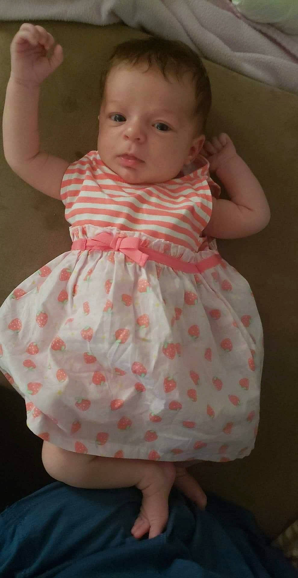 Sapphira joined the competition — help win amazing prizes! baby, baby_toddler_clothing, cheek, child, clothing, design, dress, pattern, peach, person, pink, product, sitting, skin, textile, toddler