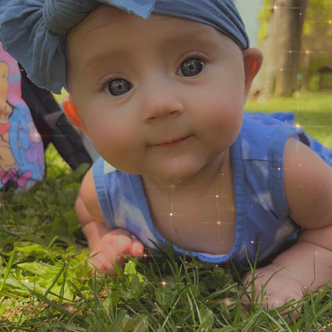 Emma joined the competition — help win amazing prizes! accessories, baby, cap, child, clothing, crawling, dress, face, female, girl, grass, hat, head, lawn, outdoors, person, photography, plant, portrait, sunhat