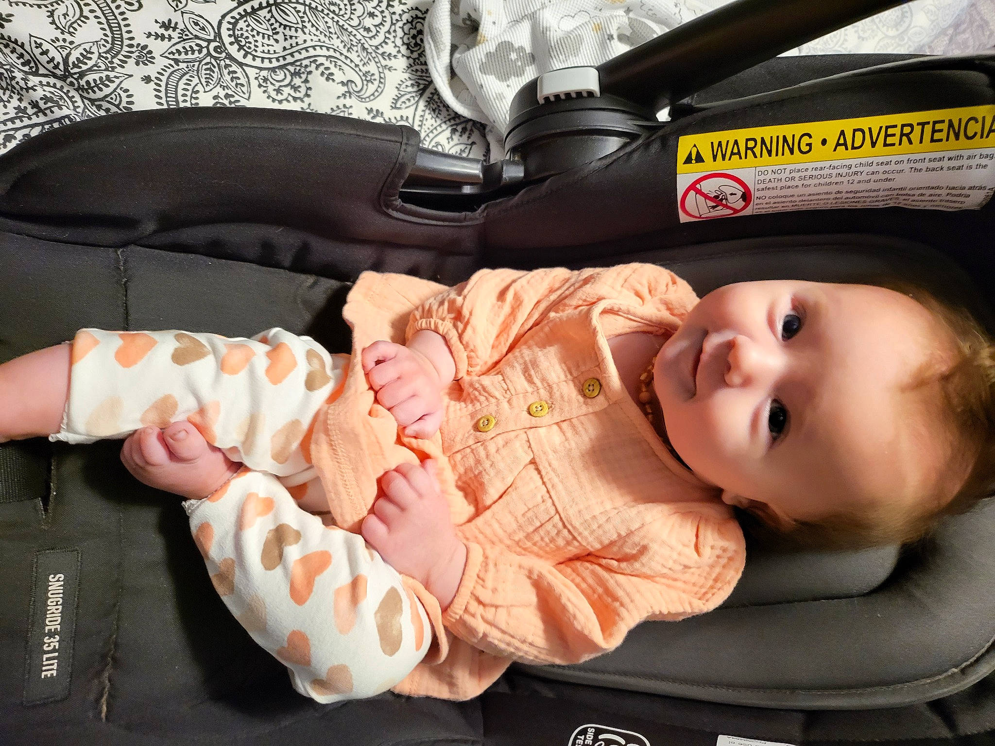 Aubrey joined the competition — help win amazing prizes! auto_part, baby, baby_carriage, baby_in_car_seat, baby_products, baby_safety, baby_toddler_clothing, car_seat, cheek, child, comfort, person, product, sitting, skin, smile, steering_wheel, toddler