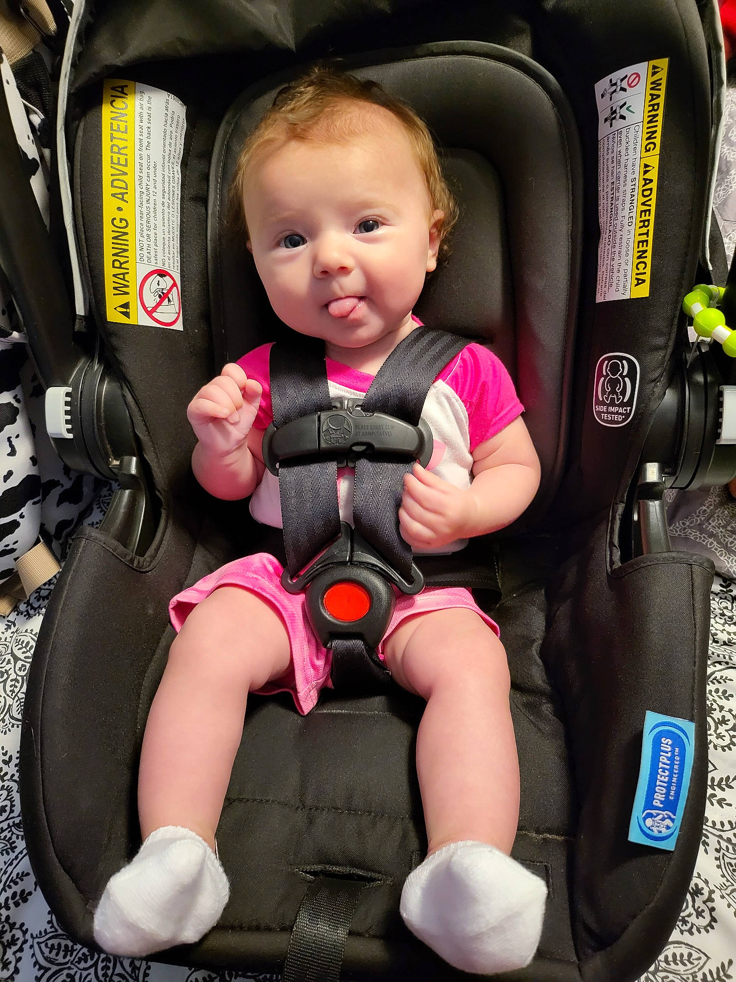 Aubrey joined the competition — help win amazing prizes! auto_part, baby, baby_carriage, baby_products, baby_toddler_clothing, car_seat, car_seat_cover, carmine, child, comfort, fun, head_restraint, human_leg, knee, lap, person, seat_belt, sitting, thigh, toddler