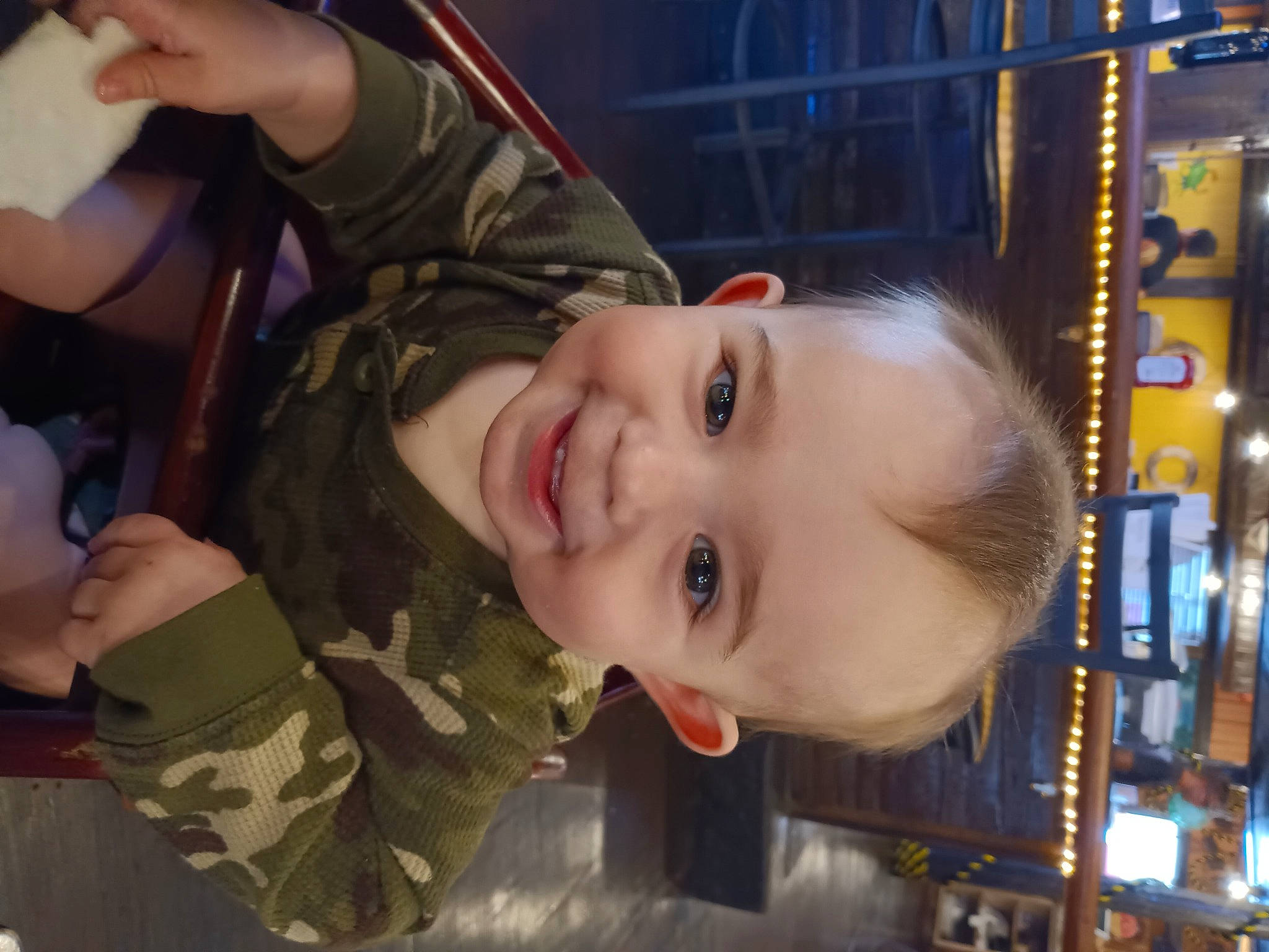 Kayson is registered to the contest to win money with this photo: baby, camouflage, cheek, child, chin, eyebrow, facial_expression, forehead, fun, gesture, happy, joy, laugh, military_camouflage, military_person, military_uniform, mouth, nose, person, skin