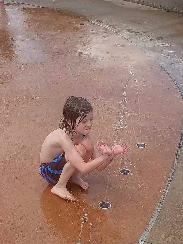 Abel joined the competition — help win amazing prizes! barechested, barefoot, bathing, body_of_water, chest, child, foot, fun, happy, human_body, human_leg, landscape, leisure, people_in_nature, people_on_beach, person, play, recreation, sand, sitting