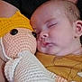 Derek is registered to the contest to win money with this photo: baby, blanket, clothing, couch, cushion, face, furniture, glove, head, homedecor, hosiery, newborn, person, photography, plush, portrait, quilt, sleeping, sock, toy