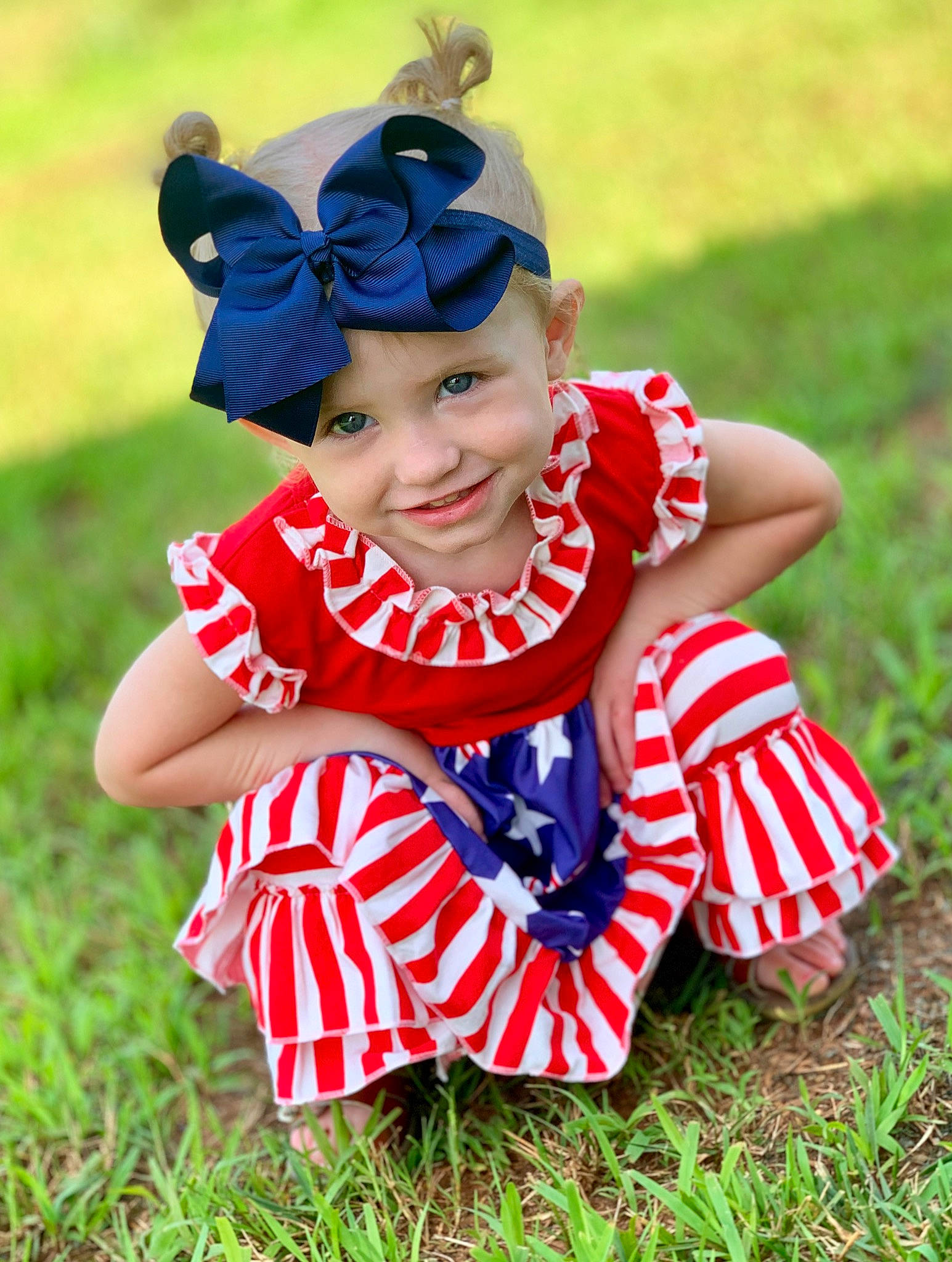 Addy joined the competition — help win amazing prizes! baby, baby_bloomers, baby_products, baby_toddler_clothing, child, costume, costume_accessory, fashion_accessory, grass, hair_accessory, headgear, joy, pattern, person, plant, play, smile, toddler