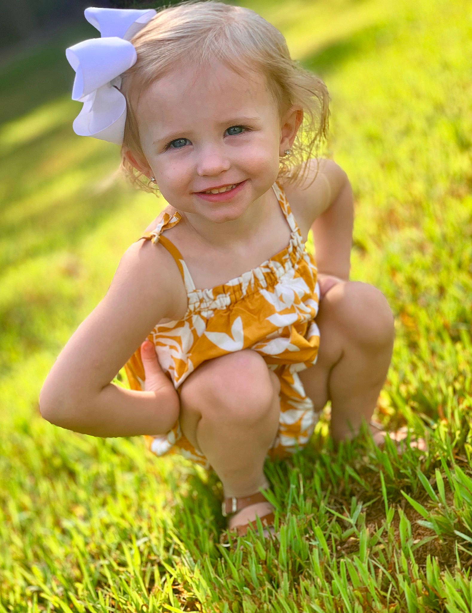 Addy is registered to the contest to win money with this photo: baby, beauty, blond, child, child_model, dress, facial_expression, grass, grass_family, happy, joy, meadow, people_in_nature, person, photograph, photography, skin, smile, summer, sunlight