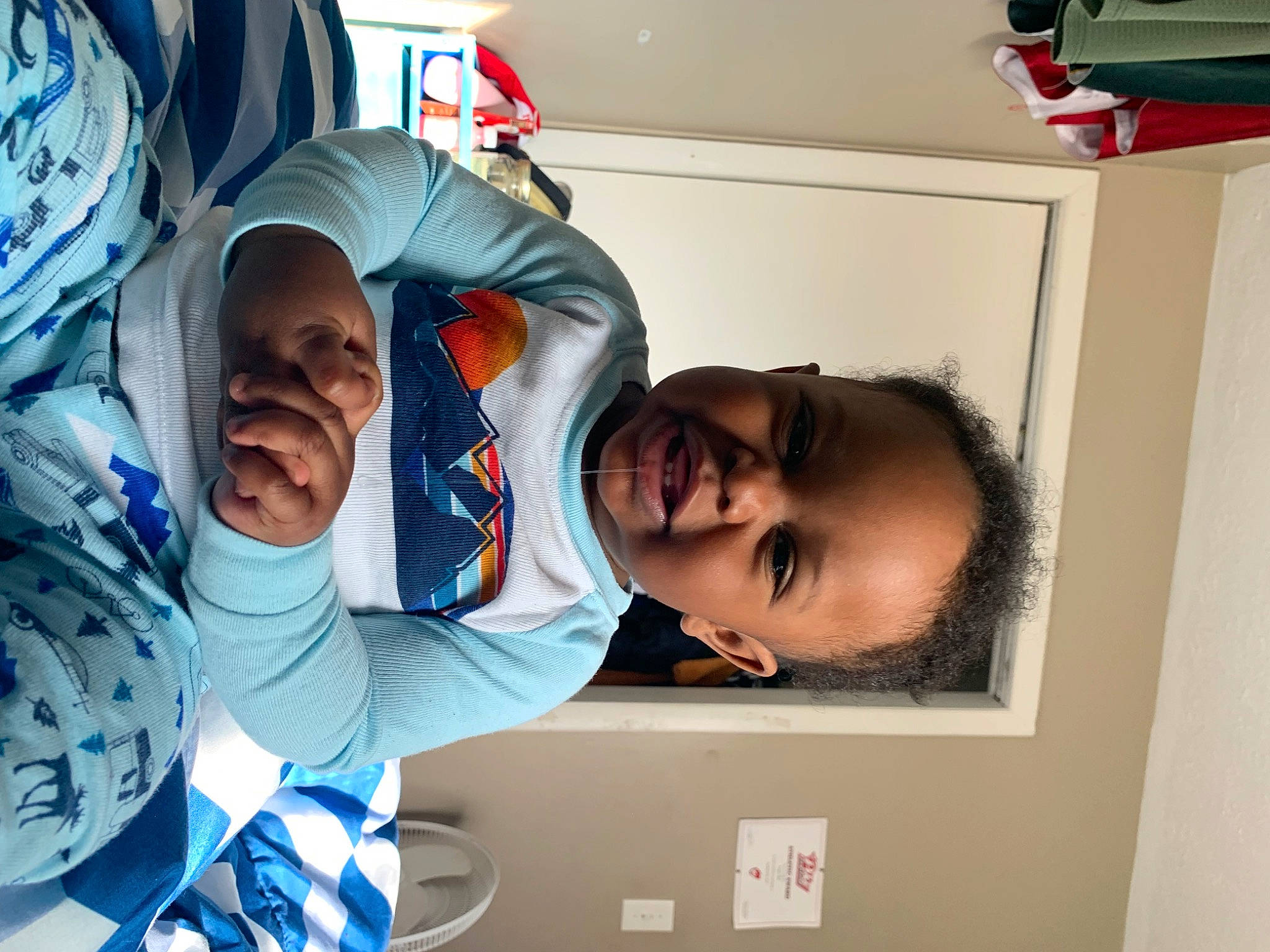 Daylen is registered to the contest to win money with this photo: baby, child, comfort, event, eyewear, fun, happy, hat, mouth, person, room, service, smile, t_shirt, toddler