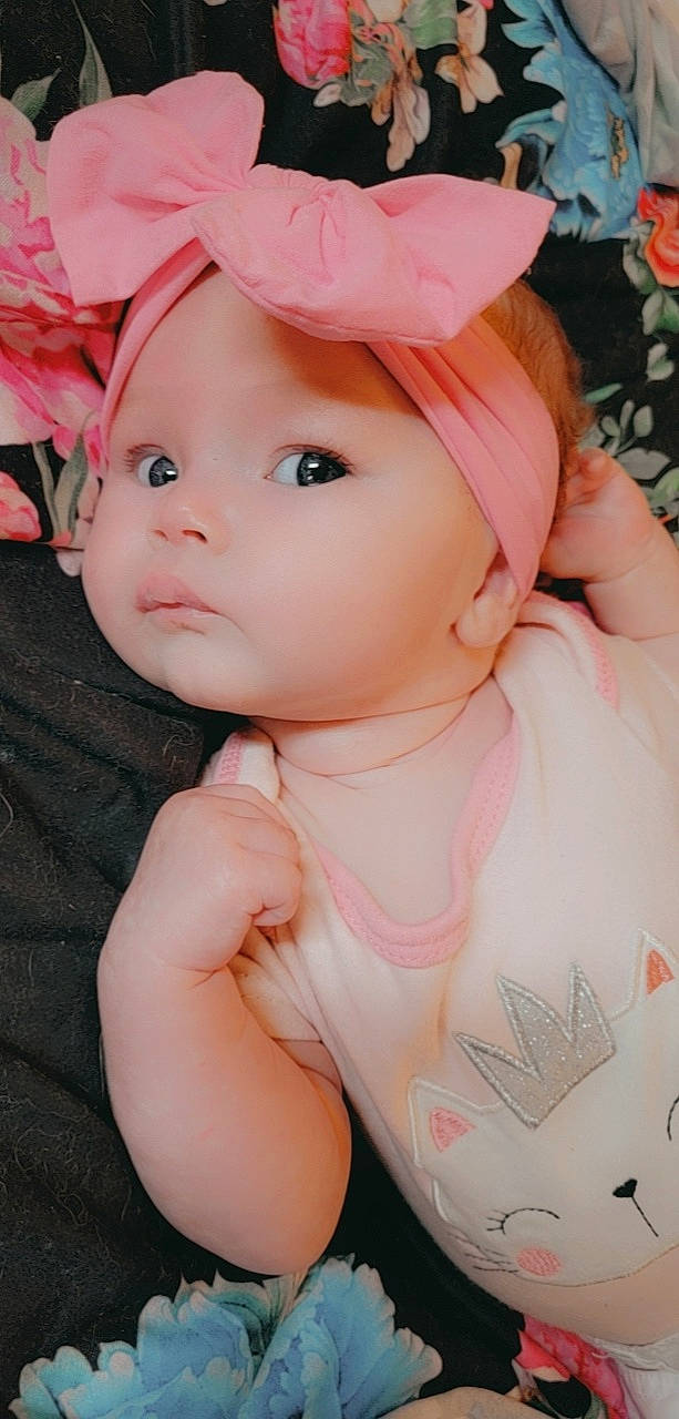 Scarlett is registered to the contest to win money with this photo: baby, baby_toddler_clothing, baseball_cap, cap, cheek, child, dress, eye, eyelash, face, happy, hat, headgear, lip, magenta, person, pink, skin, sun_hat, toddler