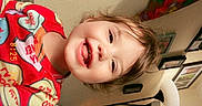 Lyric joined the competition — help win amazing prizes! toddler, child, smiling, pajamas, colorful_clothing, indoor, living_room, couch, lamp, family_photos, happy, cute, person, portrait, home, cozy, playful, young_child, fun, casual