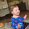 Lyric joined the competition — help win amazing prizes! toddler, child, indoor, pajamas, curly_hair, blue_pajamas, smiling, happy, living_room, wood_floor, dog_crate, cat, pet, furniture, kitchen, cabinet, refrigerator, carpet, person, play