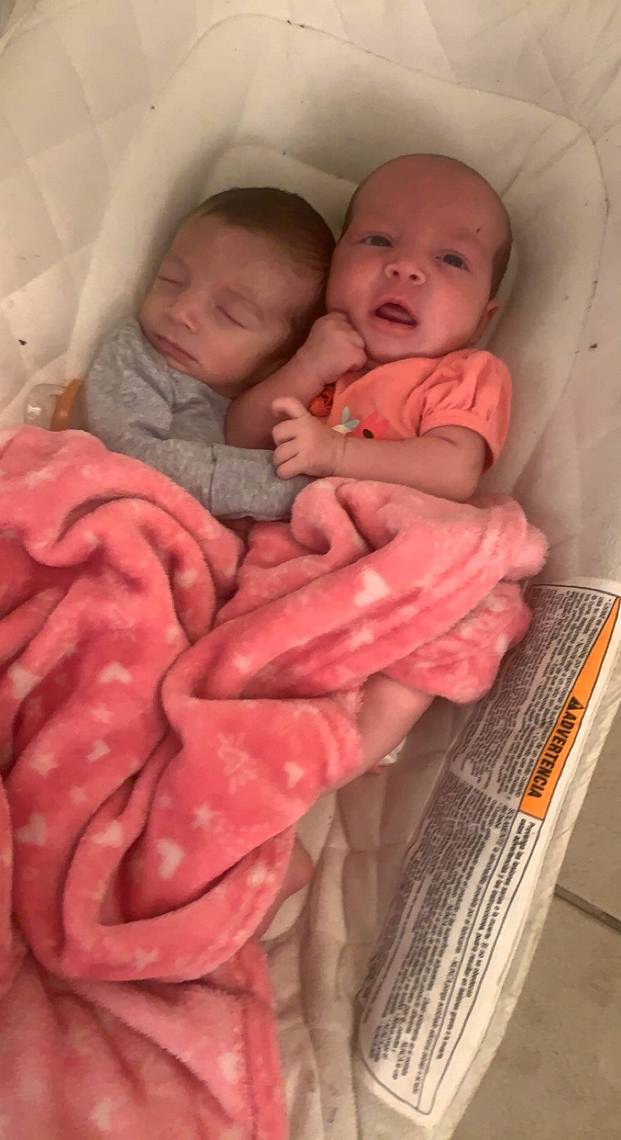 Ellianna is registered to the contest to win money with this photo: baby, baby_sleeping, baby_toddler_clothing, bed, bedding, cheek, child, comfort, infant_bed, linens, lip, mouth, organ, person, pink, product, skin, sleeve, smile, textile