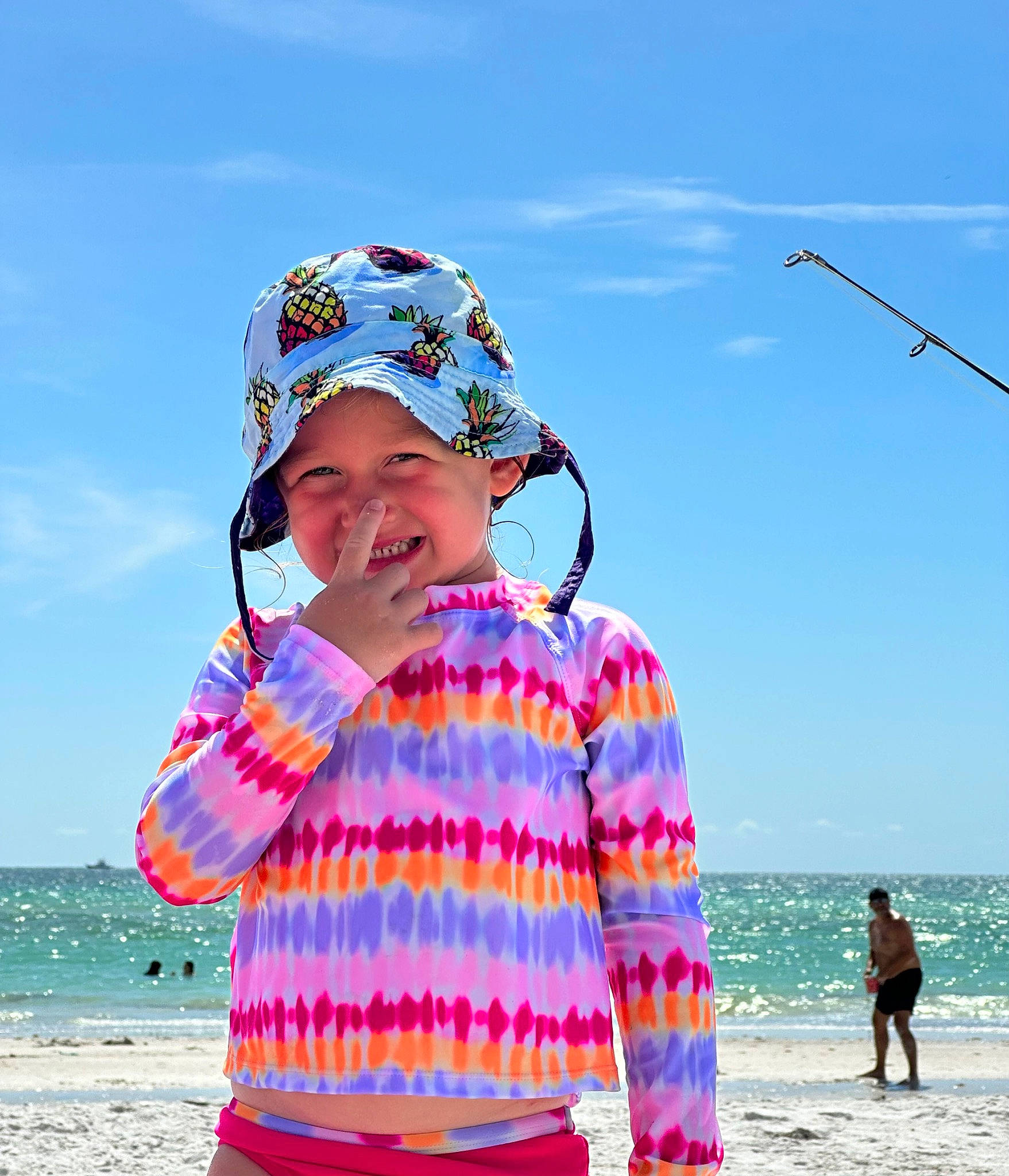 Carmen joined the competition — help win amazing prizes! beach, body_of_water, cap, cloud, cool, fun, happy, hat, headgear, headwear, human, people_in_nature, people_on_beach, person, sky, sleeve, smile, standing, sunglasses, t_shirt