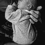 baby, newborn, sleeping, infant, monochrome, black_and_white, hand, arm, clothing, soft, peaceful, portrait, closeup, child, human, tender, care, rest, cute, person