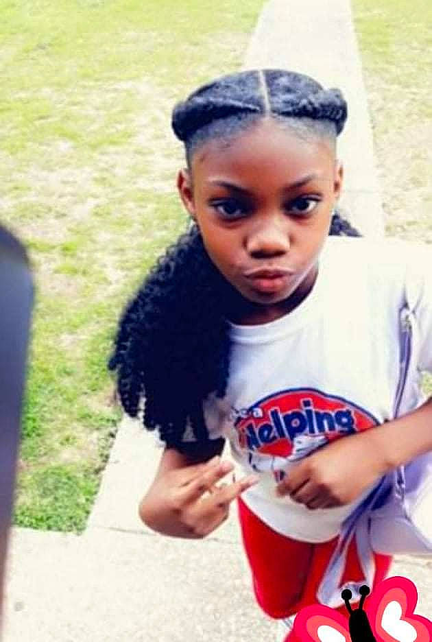 Mahogany is registered to the contest to win money with this photo: black_hair, child, cool, electric_blue, eyewear, fun, grass, happy, jewellery, leisure, lip, long_hair, mammal, necklace, person, recreation, skin, street_fashion, thigh, toddler