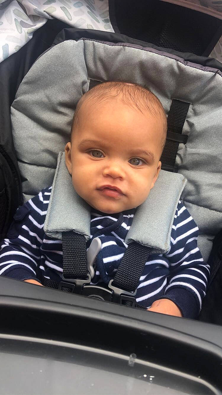 Darious is registered to the contest to win money with this photo: auto_part, baby, baby_carriage, baby_in_car_seat, baby_products, car, car_seat, cheek, child, face, forehead, head, person, product, skin, sleep, toddler, vacation