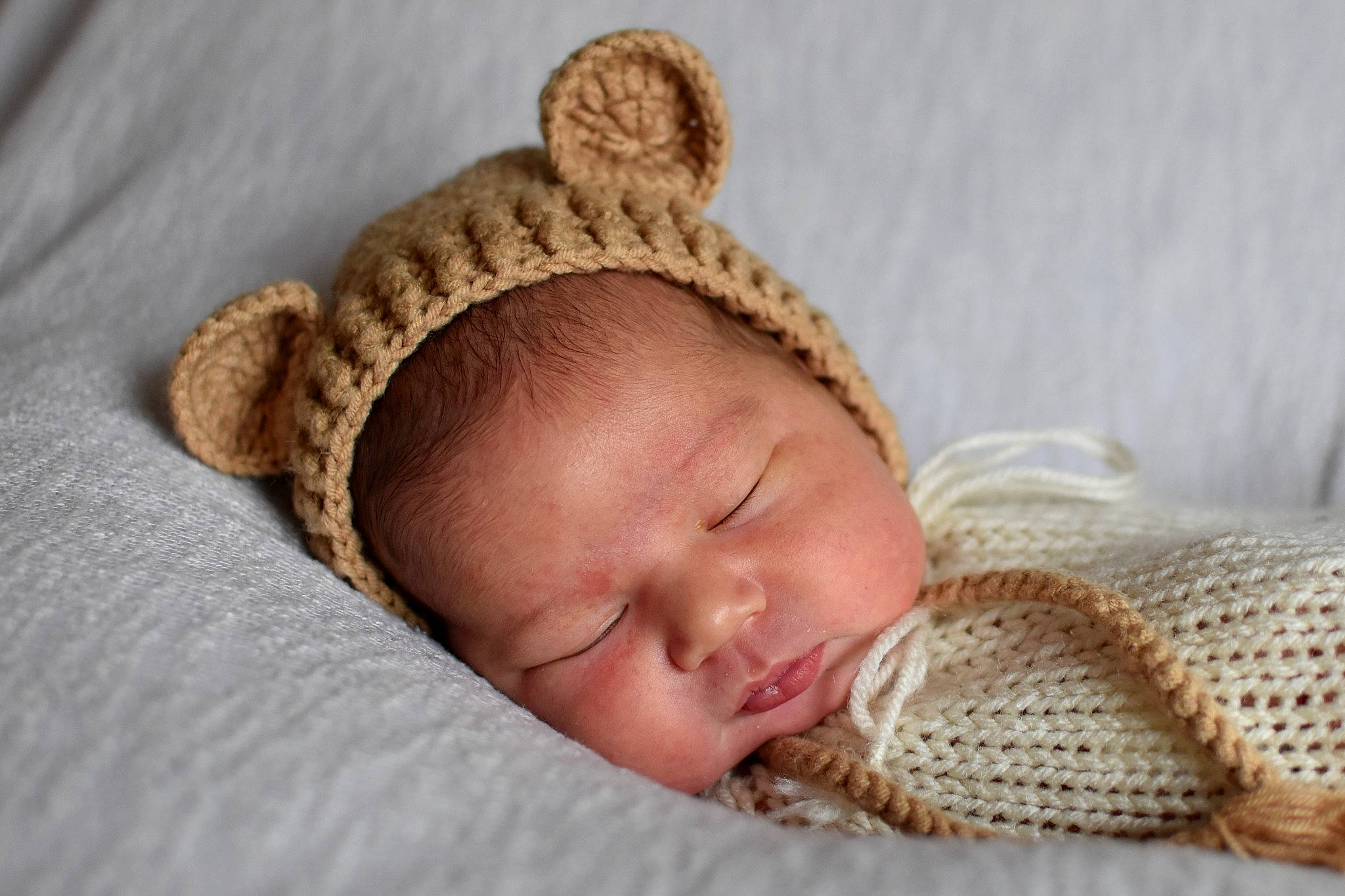 Michelangelo joined the competition — help win amazing prizes! baby, baby_sleeping, baby_toddler_clothing, beanie, bedtime, cheek, comfort, eye, fashion_accessory, fur, hair_accessory, head, knit_cap, linens, nap, person, portrait_photography, toddler, towel, wood