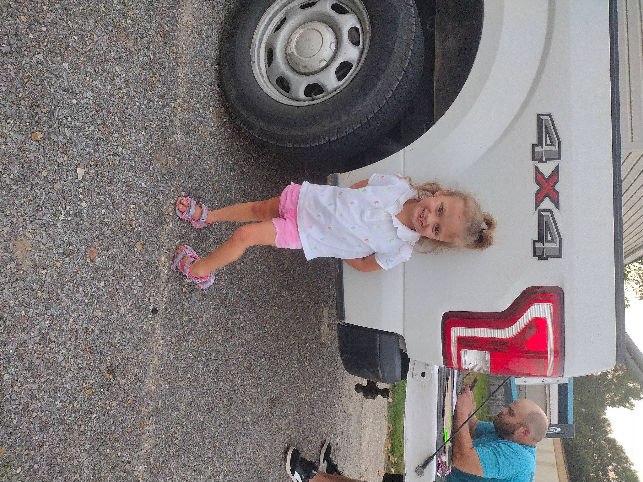 Wynter joined the competition — help win amazing prizes! alloy_wheel, automotive_exterior, automotive_lighting, automotive_tire, automotive_wheel_system, car, fender, hubcap, joy, motor_vehicle, people, person, product, smile, synthetic_rubber, tire, tire_care, toddler, tread, vehicle