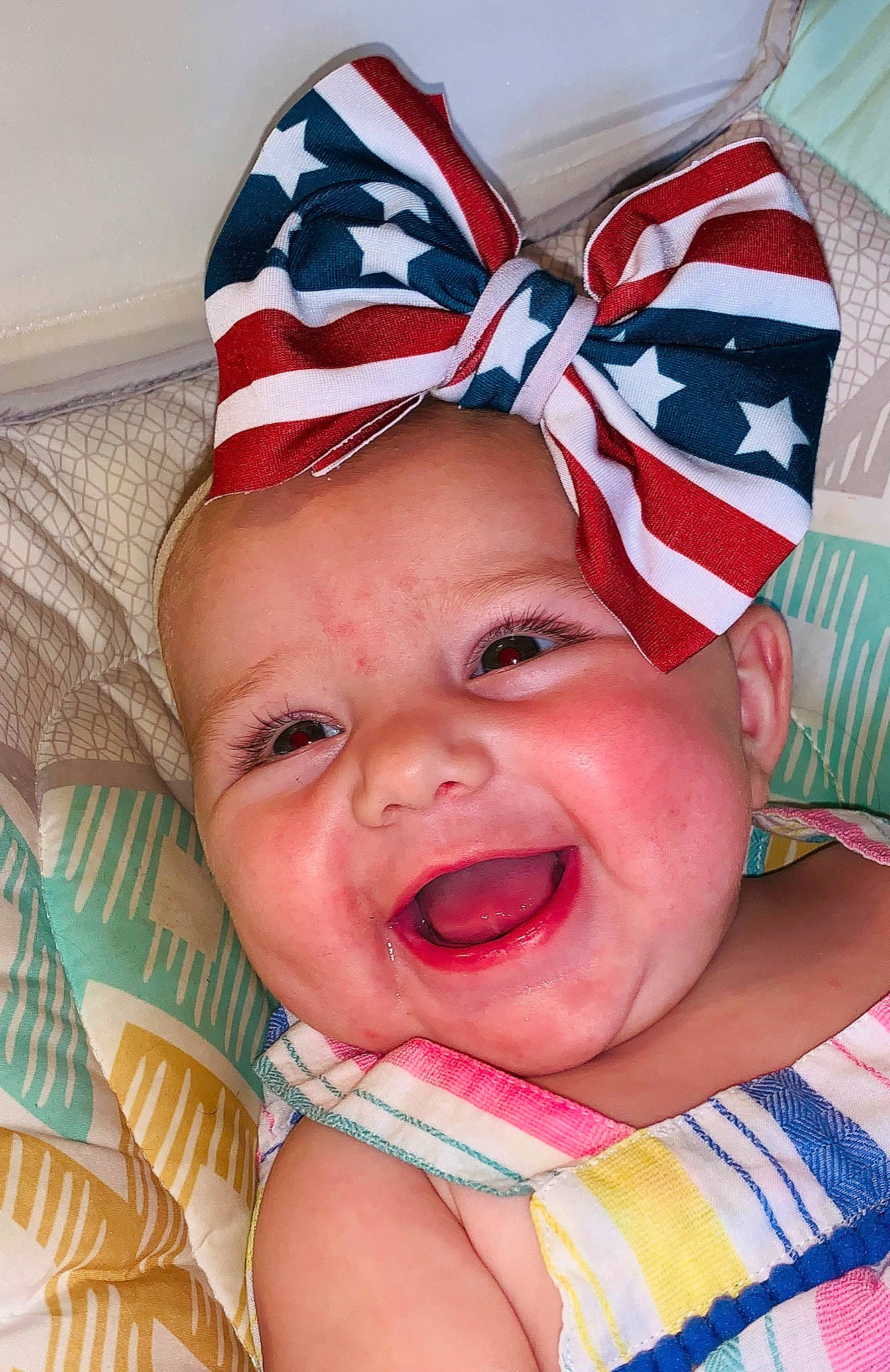 Kenleigh joined the competition — help win amazing prizes! baby, baby_making_funny_faces, child, face, facial_expression, fashion_accessory, head, headgear, laugh, lip, mouth, nose, person, skin, smile, toddler