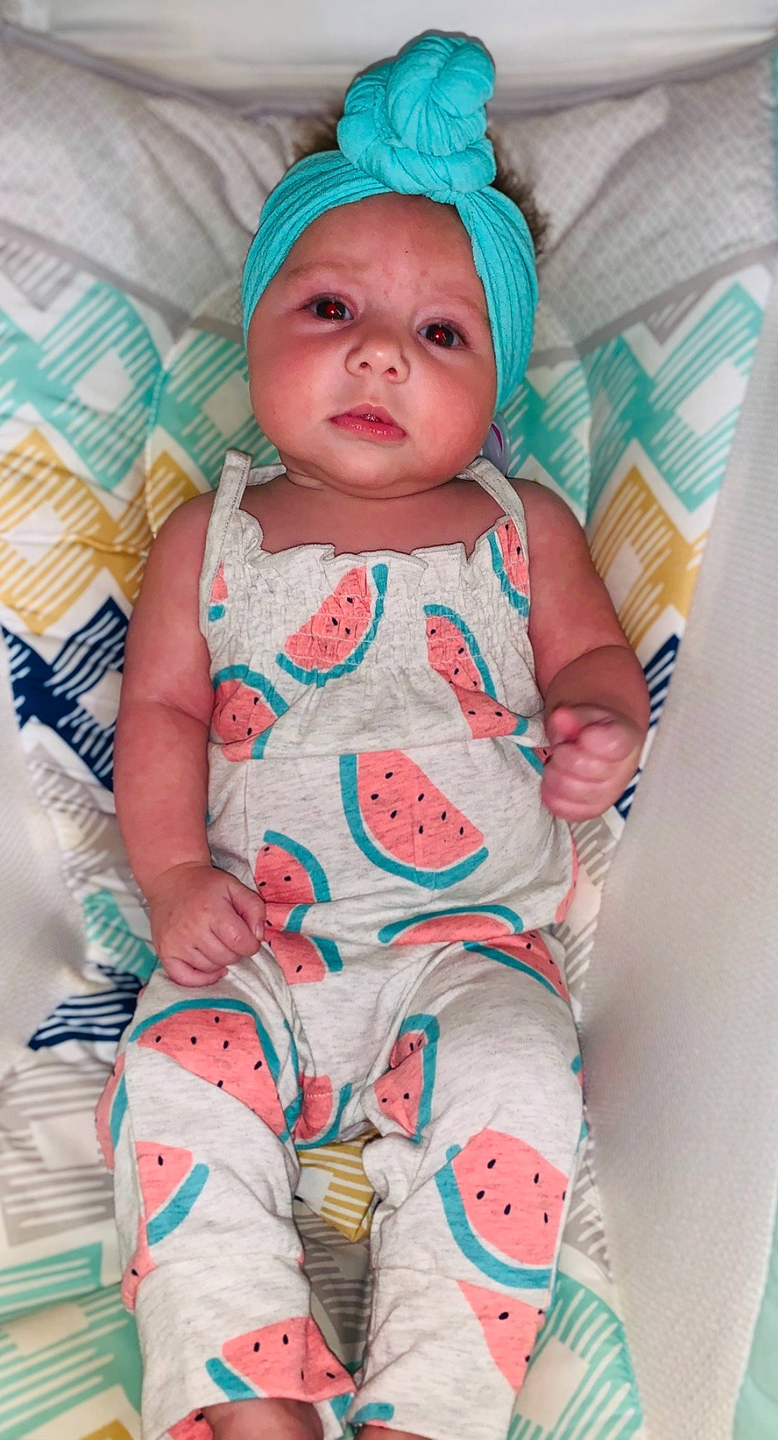 Makenleigh is registered to the contest to win money with this photo: baby, baby_products, baby_toddler_clothing, blue, child, headgear, pattern, person, pink, product, skin, smile, toddler, turquoise