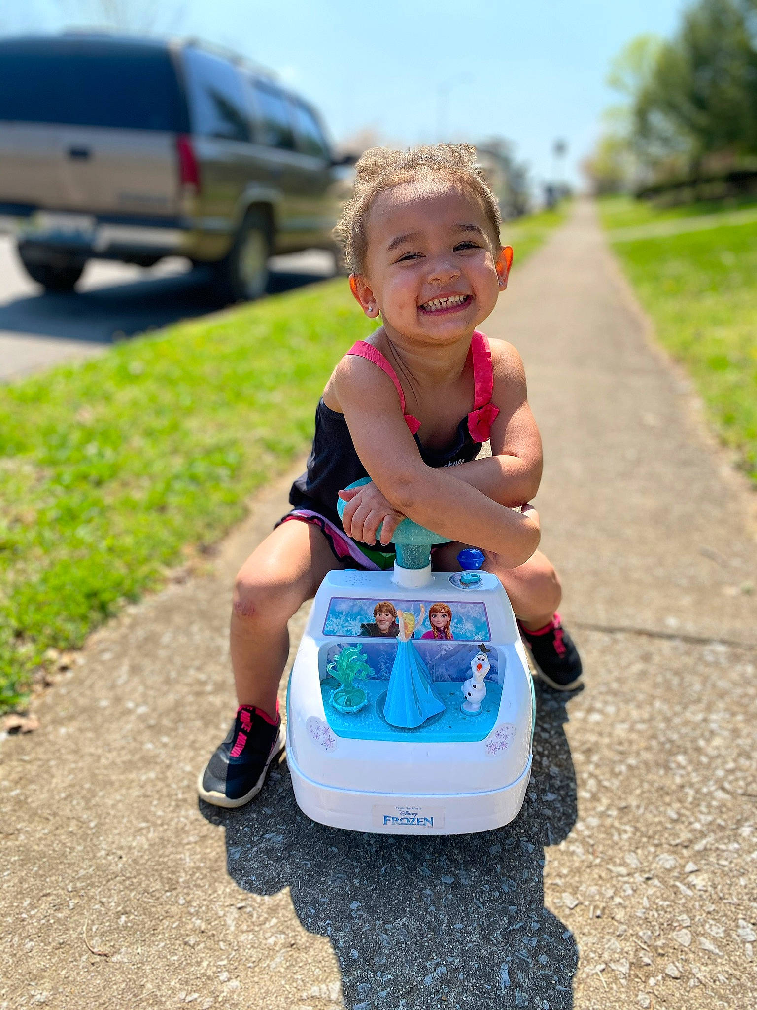 Gabriella joined the competition — help win amazing prizes! car, child, fun, grass, joy, leisure, person, play, product, summer, toddler, travel, vacation, vehicle
