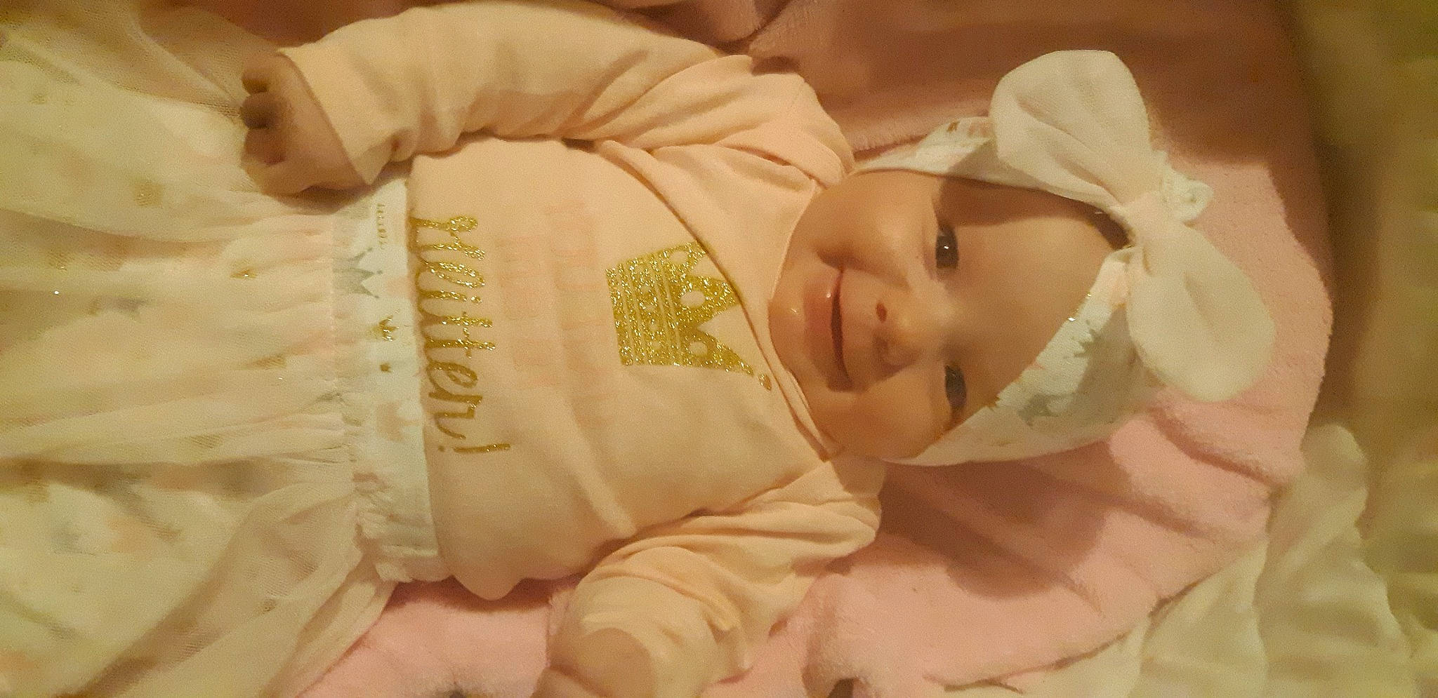 Lillie is registered to the contest to win money with this photo: baby, baby_products, baby_sleeping, baby_toddler_clothing, bedtime, child, comfort, grass, happy, hat, headwear, joy, linens, nap, person, portrait_photography, skin, sleep, sleeve, smile