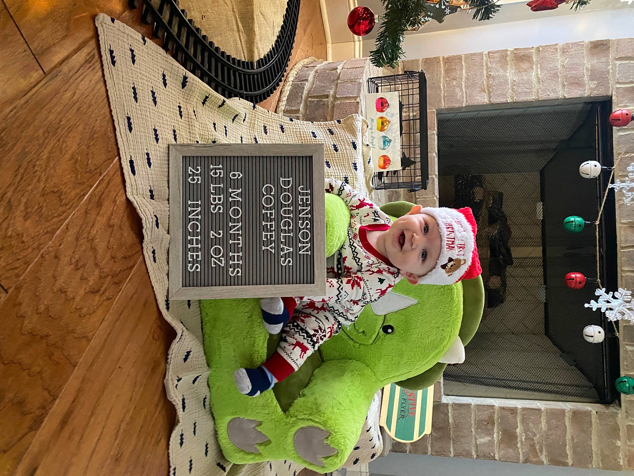 Jenson joined the competition — help win amazing prizes! child, christmas, christmas_decoration, christmas_eve, event, fictional_character, flooring, green, hardwood, headwear, holiday, house, illustration, ornament, pattern, person, room, toy, tree, wood