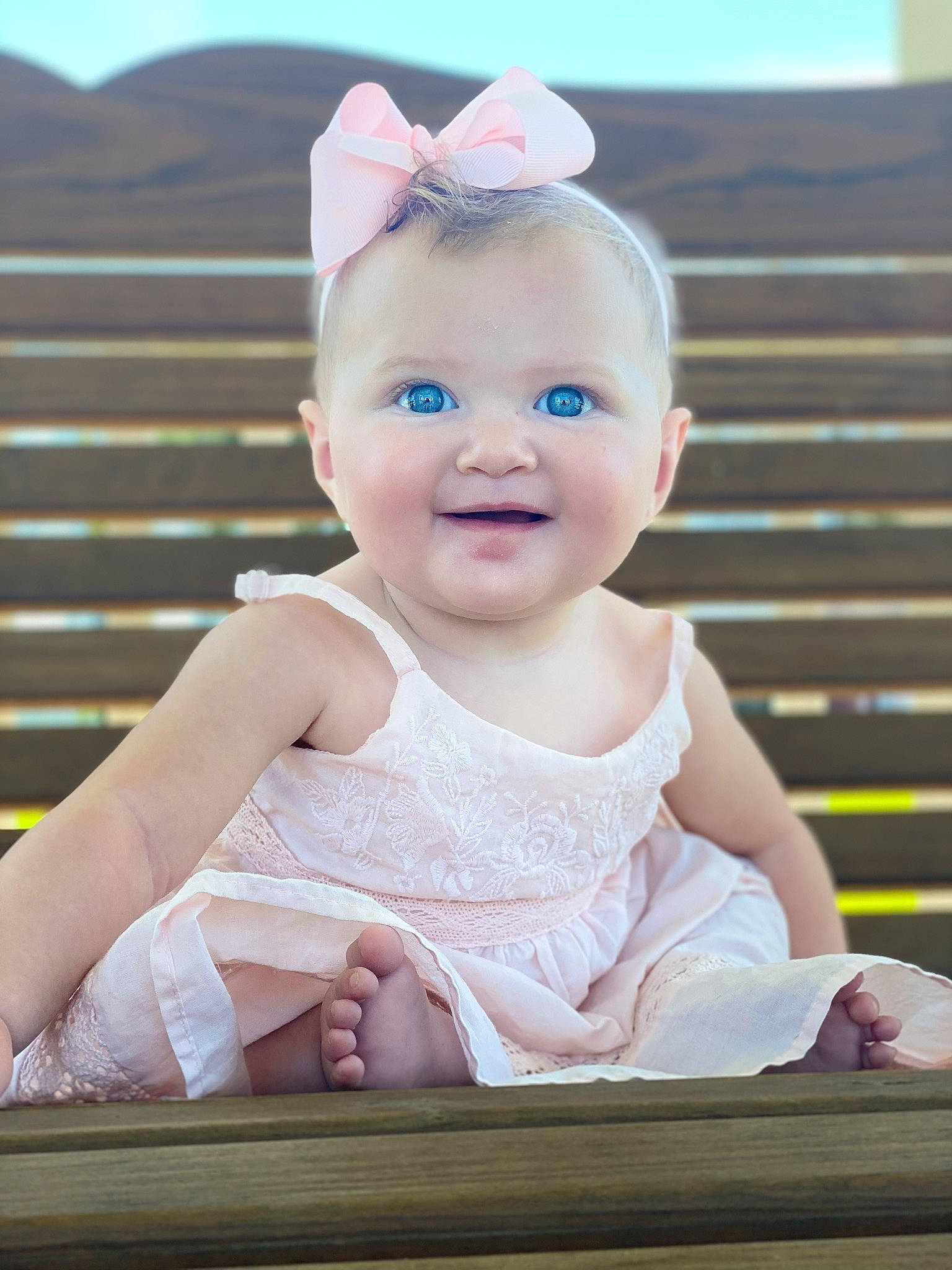 Stevie joined the competition — help win amazing prizes! baby, baby_toddler_clothing, beauty, cheek, child, dress, eye, face, hair_accessory, happy, head, headgear, joy, person, photograph, photography, pink, product, sitting, skin