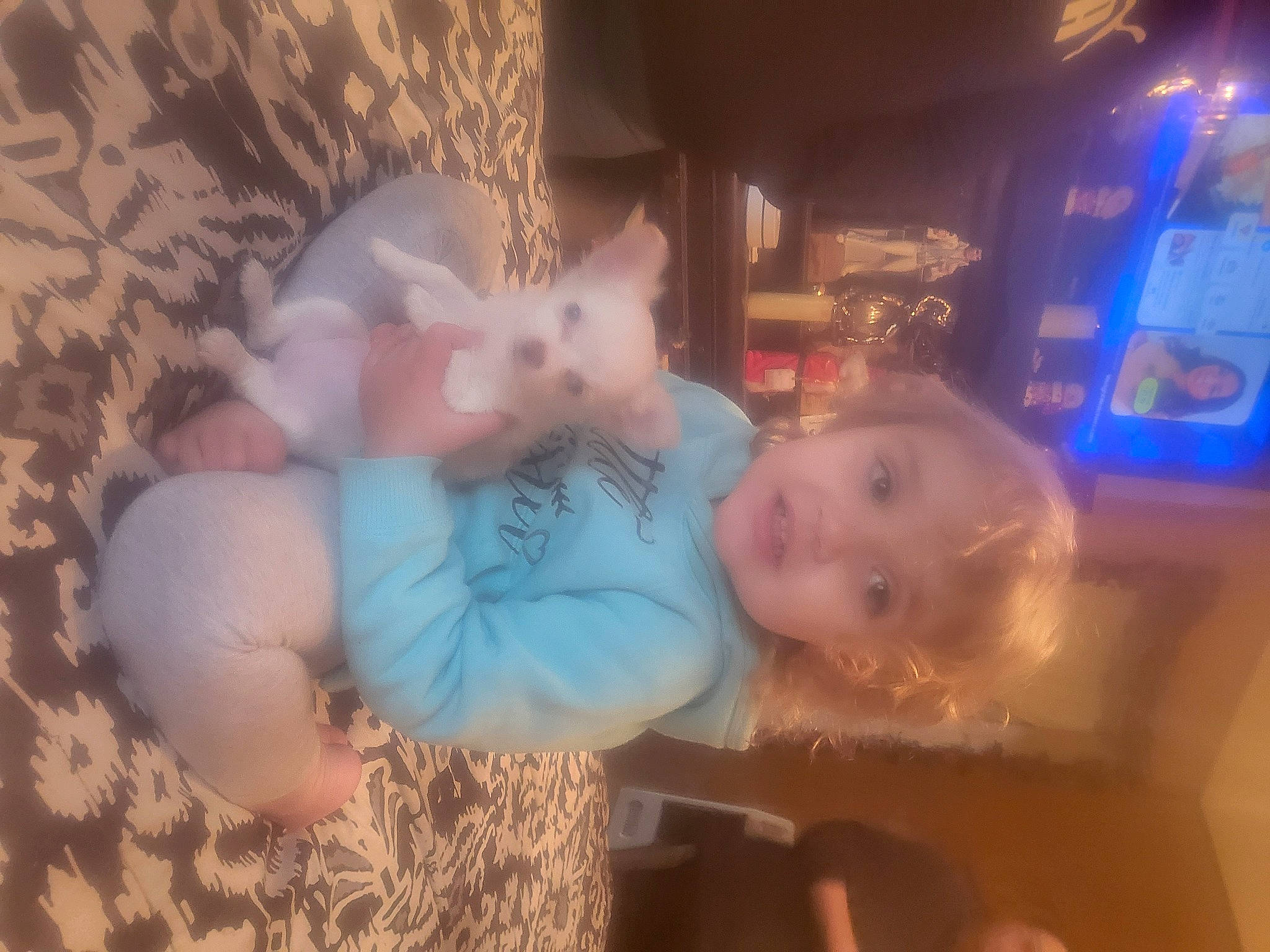 Paisley joined the competition — help win amazing prizes! automotive_lighting, baby, baby_toddler_clothing, cheek, child, ear, fun, fur, happy, holiday, iris, lap, nose, person, room, sitting, sky, smile, toddler