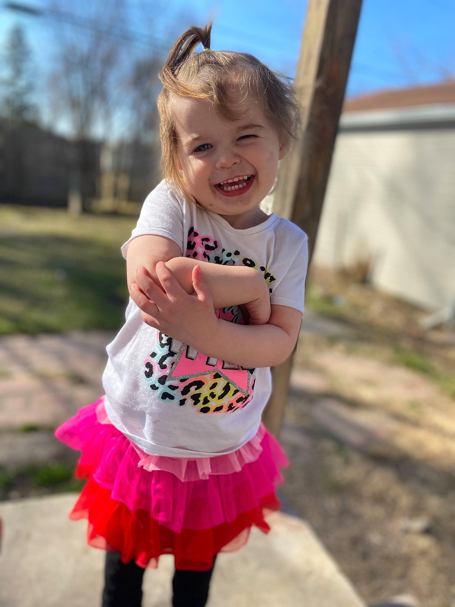 Isabella Marie joined the competition — help win amazing prizes! baby, baby_toddler_clothing, ballet_tutu, child, event, face, fun, grass, happy, joy, leisure, magenta, person, pink, recreation, sky, sleeve, smile, street_fashion, t_shirt
