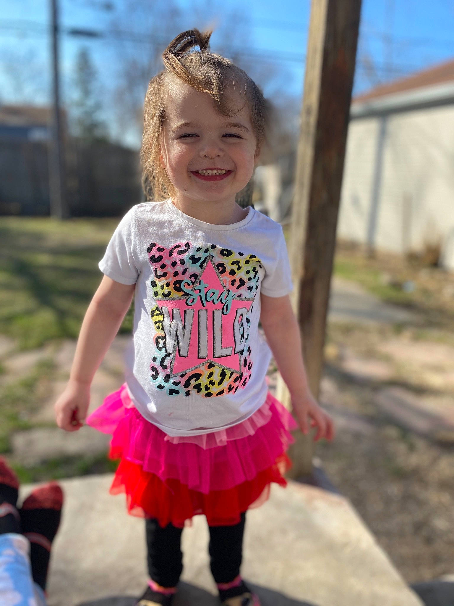 Isabella Marie is registered to the contest to win money with this photo: baby_toddler_clothing, ballet_tutu, cool, electric_blue, face, fun, grass, happy, joy, magenta, person, pink, plant, recreation, sky, sleeve, smile, street_fashion, t_shirt, toddler