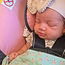 Ke'Nylah is registered to the contest to win money with this photo: baby, infant, sleeping, headband, bow, car_seat, blanket, floral_pattern, pink, child, cute, peaceful, strapped, safety_belt, close_up, indoors, soft, skin, resting, adorable