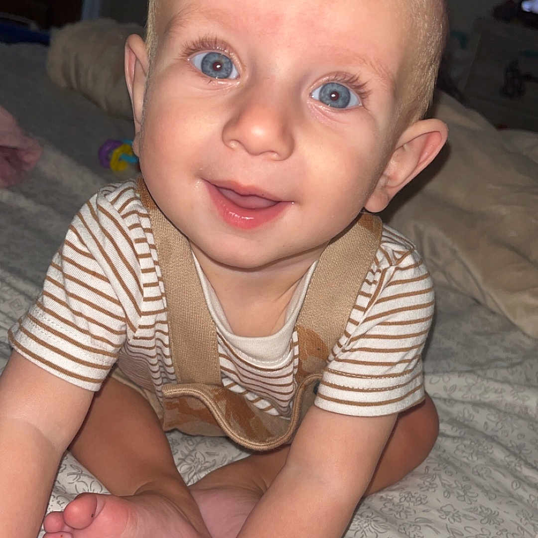 Brier joined the competition — help win amazing prizes! baby, bed, bedroom, bodypart, clothing, crawling, face, finger, furniture, hand, happy, head, indoors, newborn, person, photography, portrait, room, sitting, smile