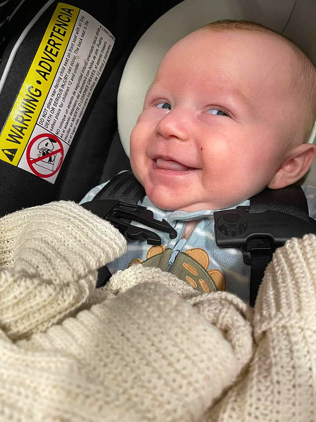 Jace joined the competition — help win amazing prizes! baby, baby_products, baby_toddler_clothing, car_seat, carmine, cheek, child, comfort, finger, happy, iris, joy, laugh, nose, pattern, person, skin, sleeve, smile, textile