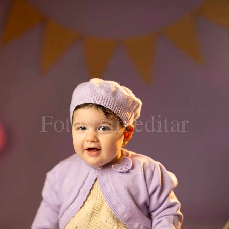 Bea Valeria joined the competition — help win amazing prizes! baby, beret, bouquet, bunting, cardigan, child, cute, flowers, hat, indoor, lilac, portrait, prop, purple, romper, rosy_cheeks, sitting, smile, studio_background, toddler