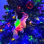 Willow joined the competition — help win amazing prizes! cat, christmas_tree, christmas_lights, ornaments, black_and_white_cat, holiday, decorations, festive, indoor, pets, animal, colorful, glowing, tree_branch, celebration, cute, curious, feline, christmas, greenery