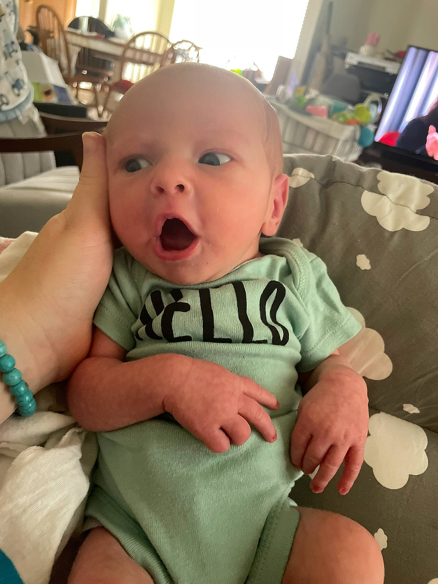 Palmer joined the competition — help win amazing prizes! baby, baby_products, baby_toddler_clothing, chair, cheek, chest, child, comfort, eyelash, flag, happy, iris, mouth, person, room, sitting, skin, sleeve, surprise, thigh