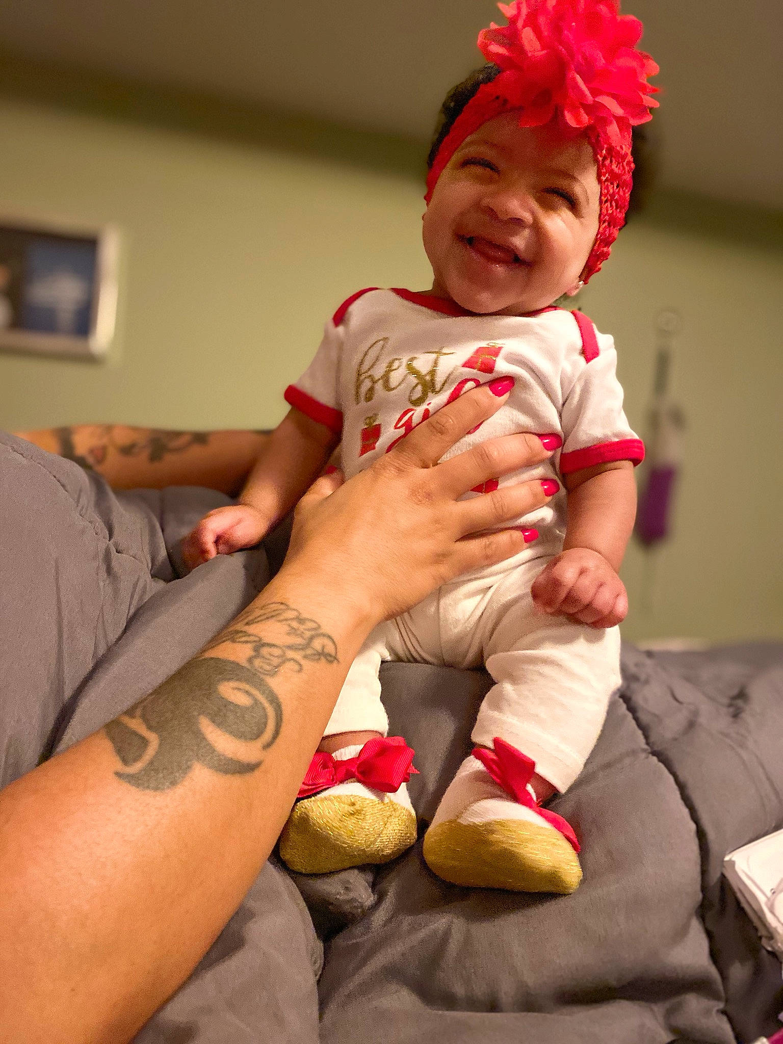 Aubrei joined the competition — help win amazing prizes! arm, baby, child, elbow, finger, foot, hand, human_body, human_leg, joint, leg, nail, person, play, sitting, skin, smile, thigh, thumb, toddler