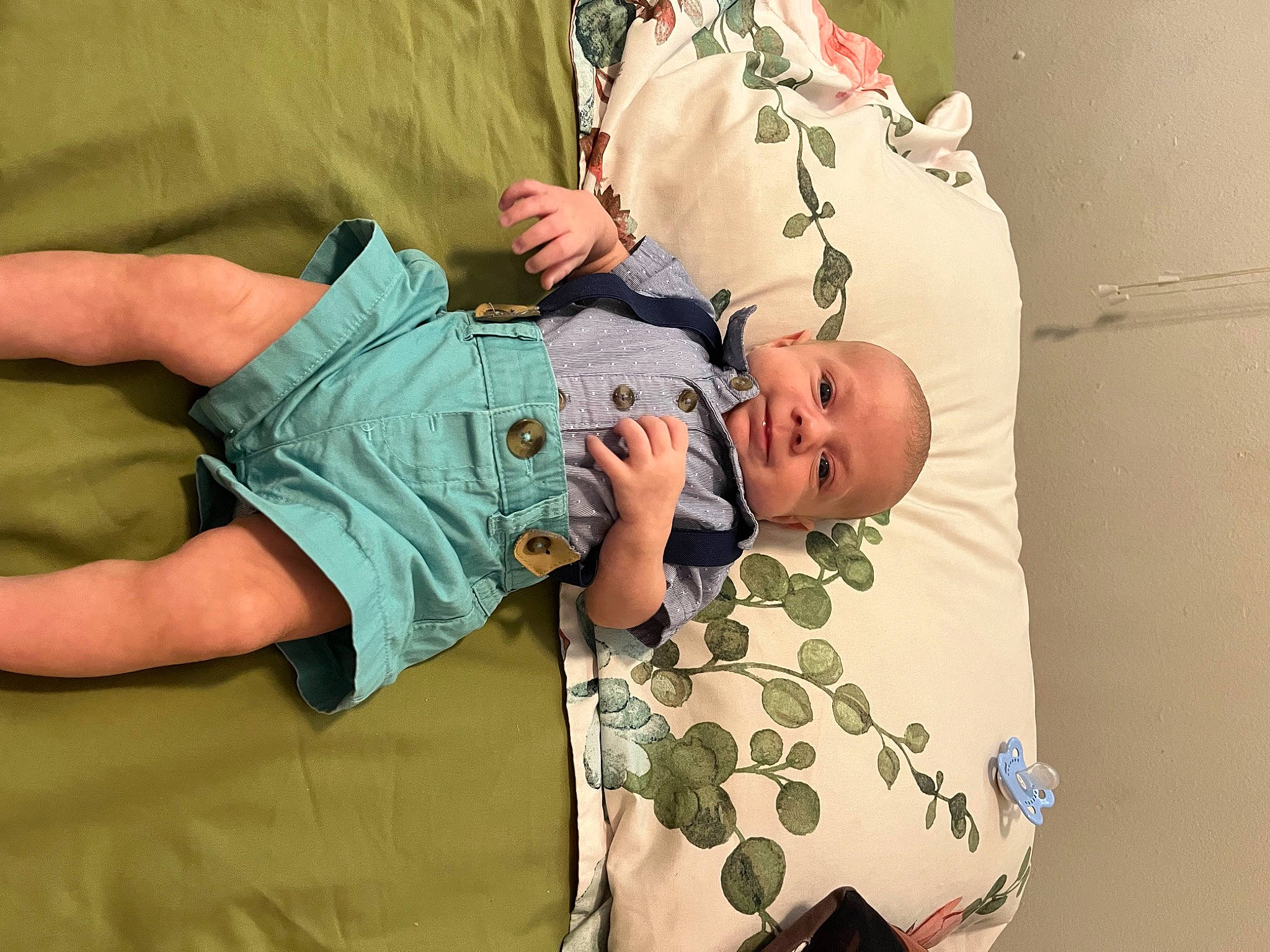 Colton joined the competition — help win amazing prizes! abdomen, baby, baby_products, baby_toddler_clothing, child, comfort, elbow, gesture, happy, human_body, knee, linens, military_camouflage, pattern, person, room, sitting, sleep, sleeve, smile