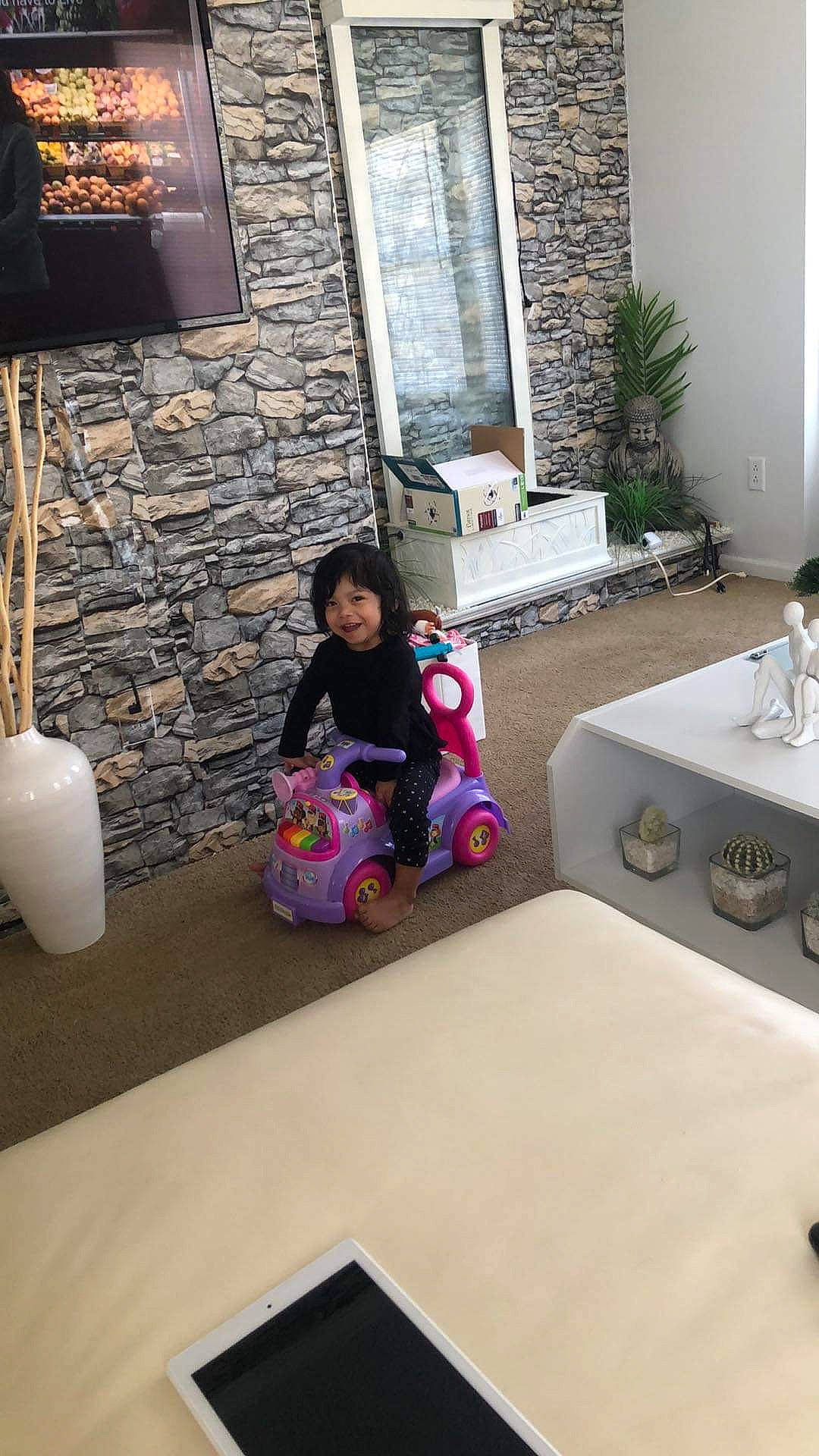 Araceli is registered to the contest to win money with this photo: art, bathroom, floor, flooring, hardwood, house, interior_design, joy, leisure, living_room, magenta, person, picture_frame, plant, plumbing_fixture, property, purple, sink, t_shirt, tap