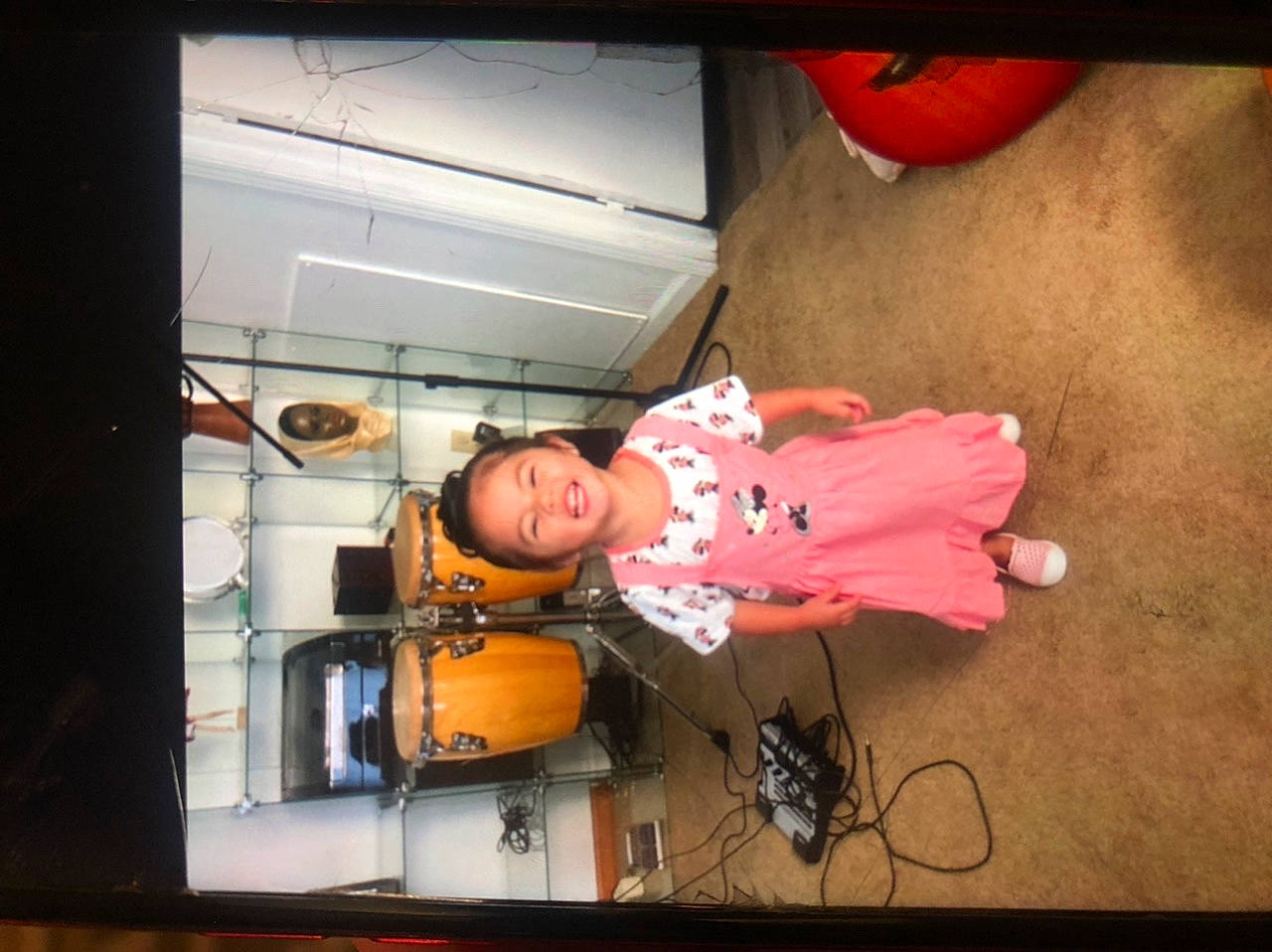 Ximena joined the competition — help win amazing prizes! baby, blurred, child, display_device, entertainment, flash_photography, flooring, fun, hat, house, joy, magenta, microphone, music, musical_instrument, musician, person, room, toddler, window