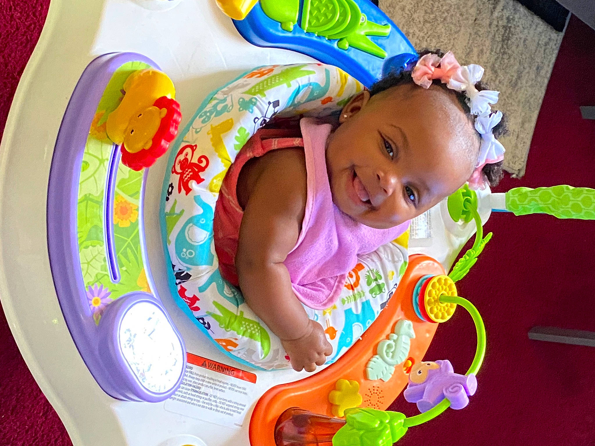 Sariyah joined the competition — help win amazing prizes! art, baby, baby_products, baby_toddler_clothing, baby_toys, child, circle, dishware, fun, happy, joy, leisure, magenta, person, pink, play, room, smile, toddler