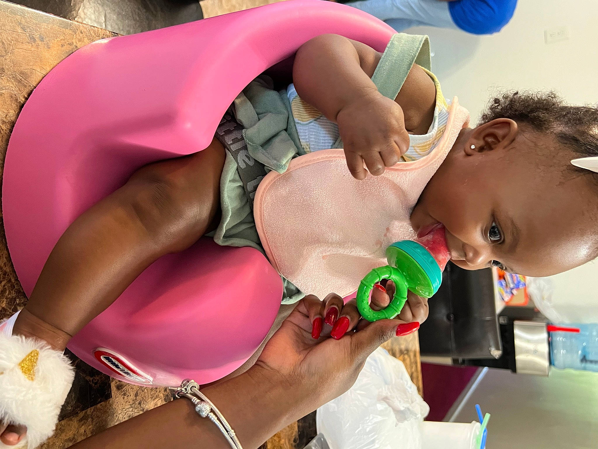 Sariyah is registered to the contest to win money with this photo: abdomen, art, baby, baby_products, brassiere, chest, child, event, finger, fun, happy, jewellery, leisure, magenta, mouth, person, pink, play, recreation, thigh