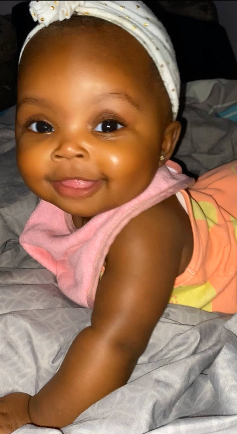 Sariyah joined the competition — help win amazing prizes! baby, cap, cheek, child, chin, comfort, elbow, finger, forehead, gesture, happy, human_body, joy, lip, mouth, muscle, nose, person, pink, skin