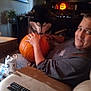 Ripley joined the competition — help win amazing prizes! box, carving, couch, decor, dog, face, fun, halloween, hand, home, indoor, light, person, pet, plant, pumpkin, remote_control, sweatshirt, table, television