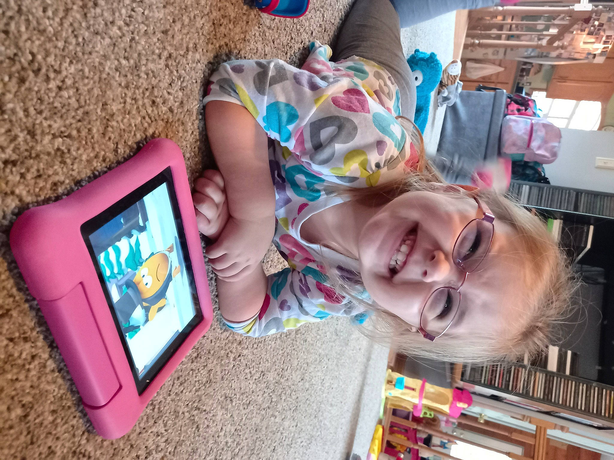 Macie is registered to the contest to win money with this photo: child, electronic_device, electronics, fun, gadget, joy, person, selfie, technology