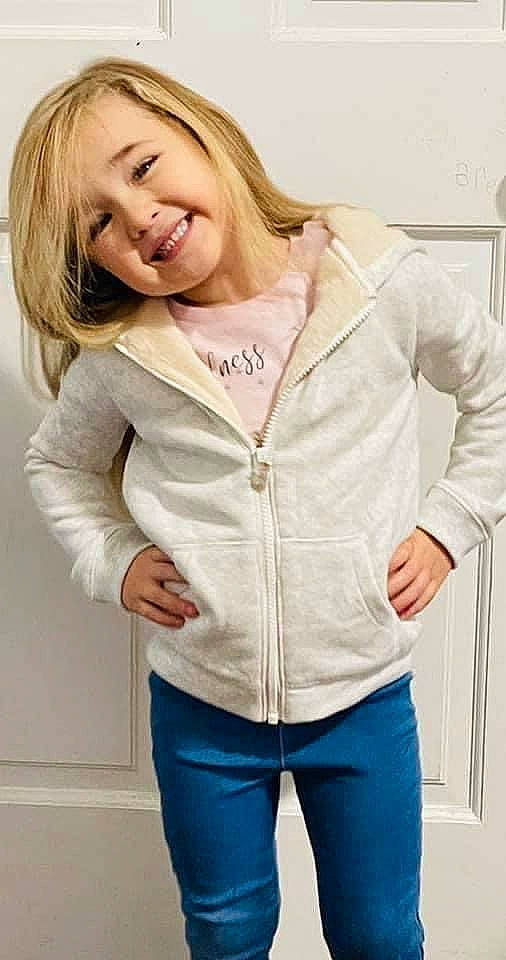 Marianna is registered to the contest to win money with this photo: chin, face, fashion, flash_photography, gesture, hair, happy, head, joint, joy, lip, neck, outerwear, person, shoulder, skin, sleeve, smile, sportswear, standing