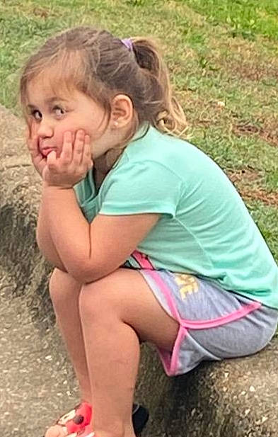 Karley joined the competition — help win amazing prizes! child, foot, fun, grass, grass_family, happy, head, human_leg, joint, knee, leisure, mammal, mouth, people_in_nature, person, recreation, sitting, soil, thigh, thumb