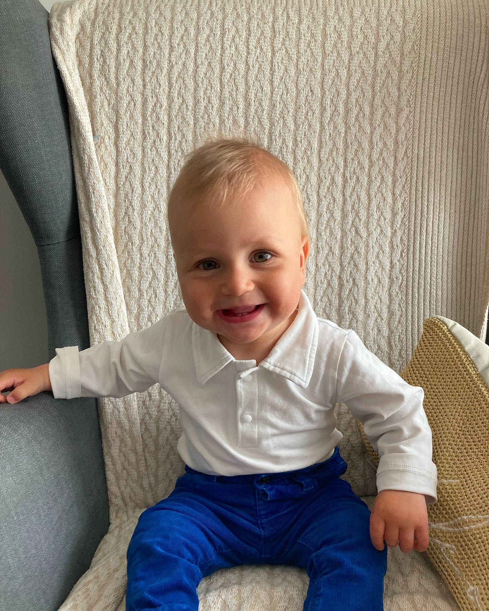 Filip is registered to the contest to win money with this photo: baby, baby_toddler_clothing, chair, cheek, comfort, couch, eye, face, furniture, hair, hairstyle, happy, head, iris, joy, person, product, skin, sleeve, smile