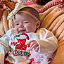baby, blanket, bow, cheerful, child, christmas, clothing, cute, decorations, festive, gift, headband, holiday, holiday_outfit, indoors, infant, portrait, red, smiling, white